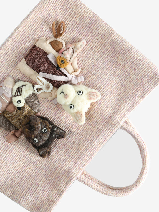 Close up of white bag,showing texture of the wool fabric