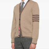 Brown knitwear worn by a person, showing the knitwear's fit