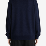 Navy knitwear, full body view