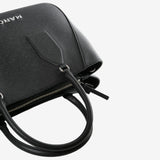 Close up of black bag, showing texture of the polyurethane fabric