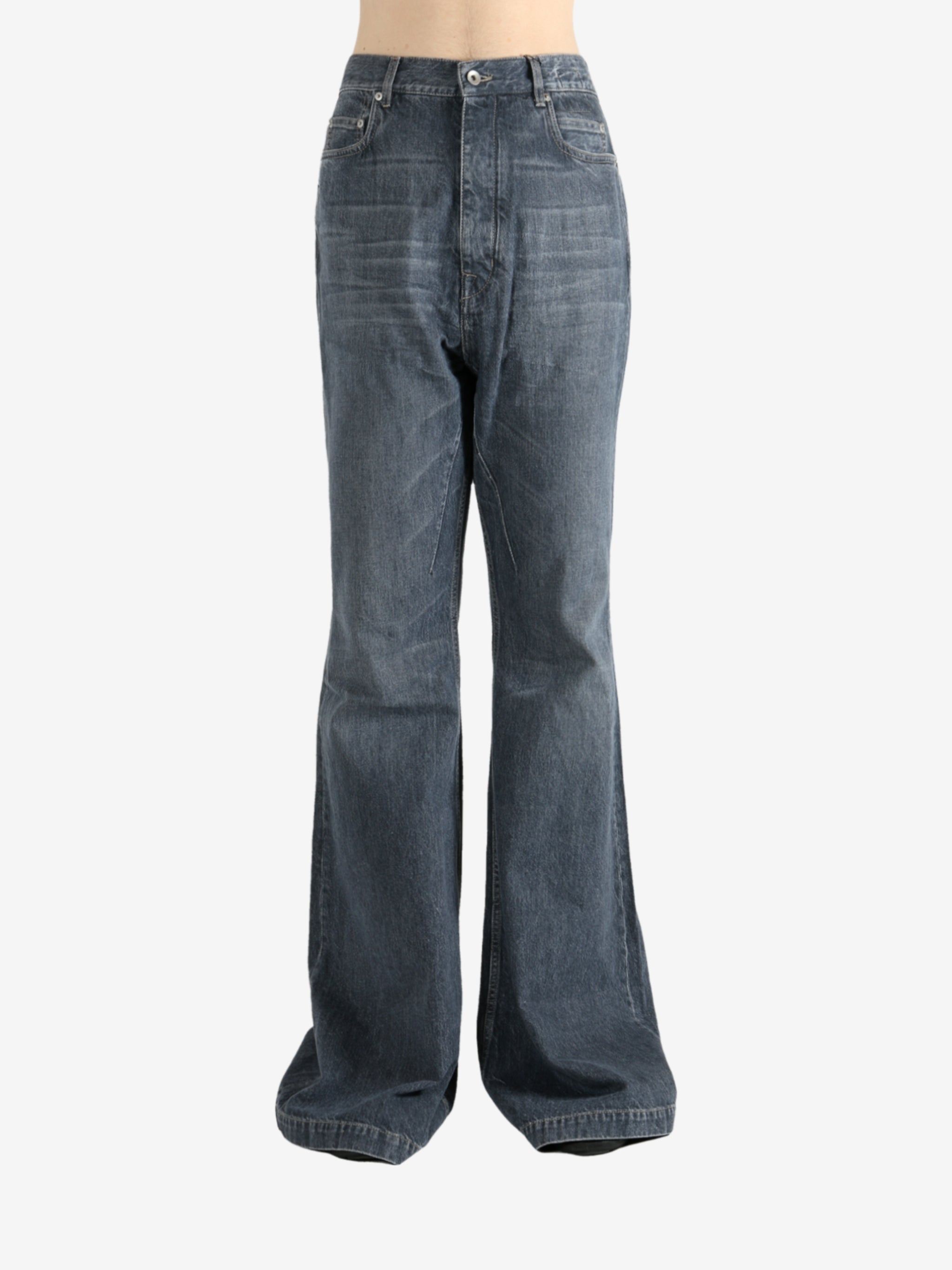 Blue pants worn by a person, showing the pants's fit