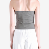 Grey top worn by a person, showing the top fit
