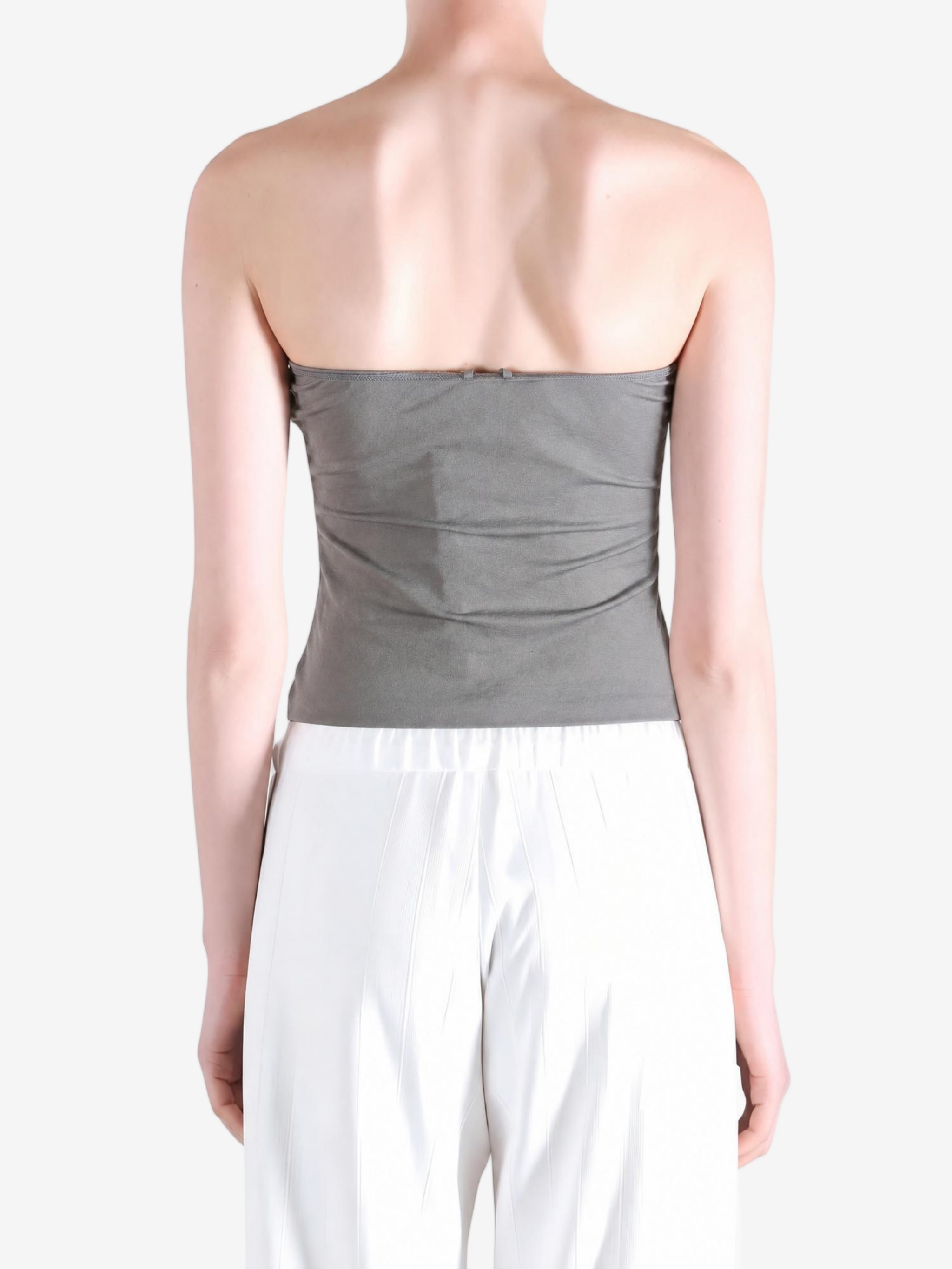 Grey top worn by a person, showing the top fit