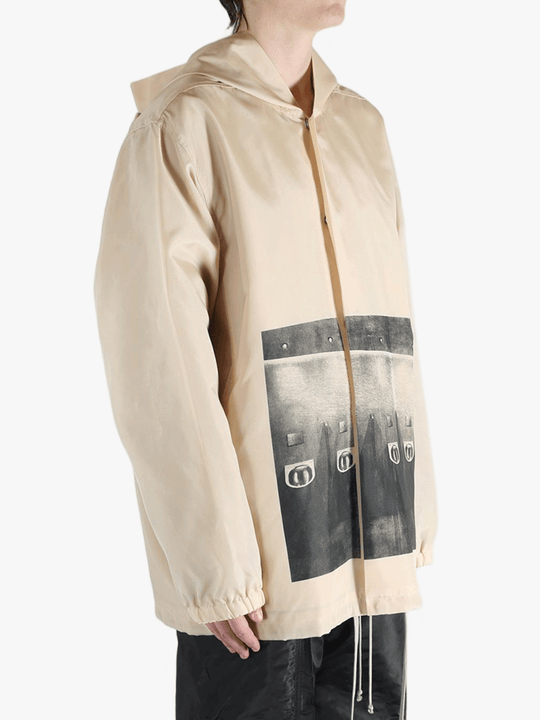 Tan jacket worn by a person, showing the jacket's fit