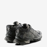 Grey sneakers, back view