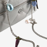 Close up of gery bag, showing texture of the leather fabric