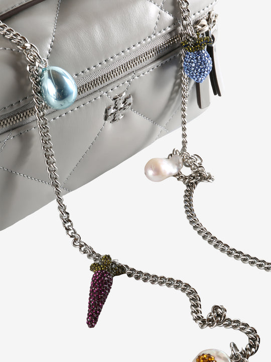 Close up of gery bag, showing texture of the leather fabric