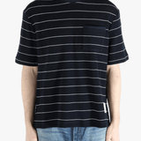 Navy t-shirt worn by a person, showing the t-shirt fit