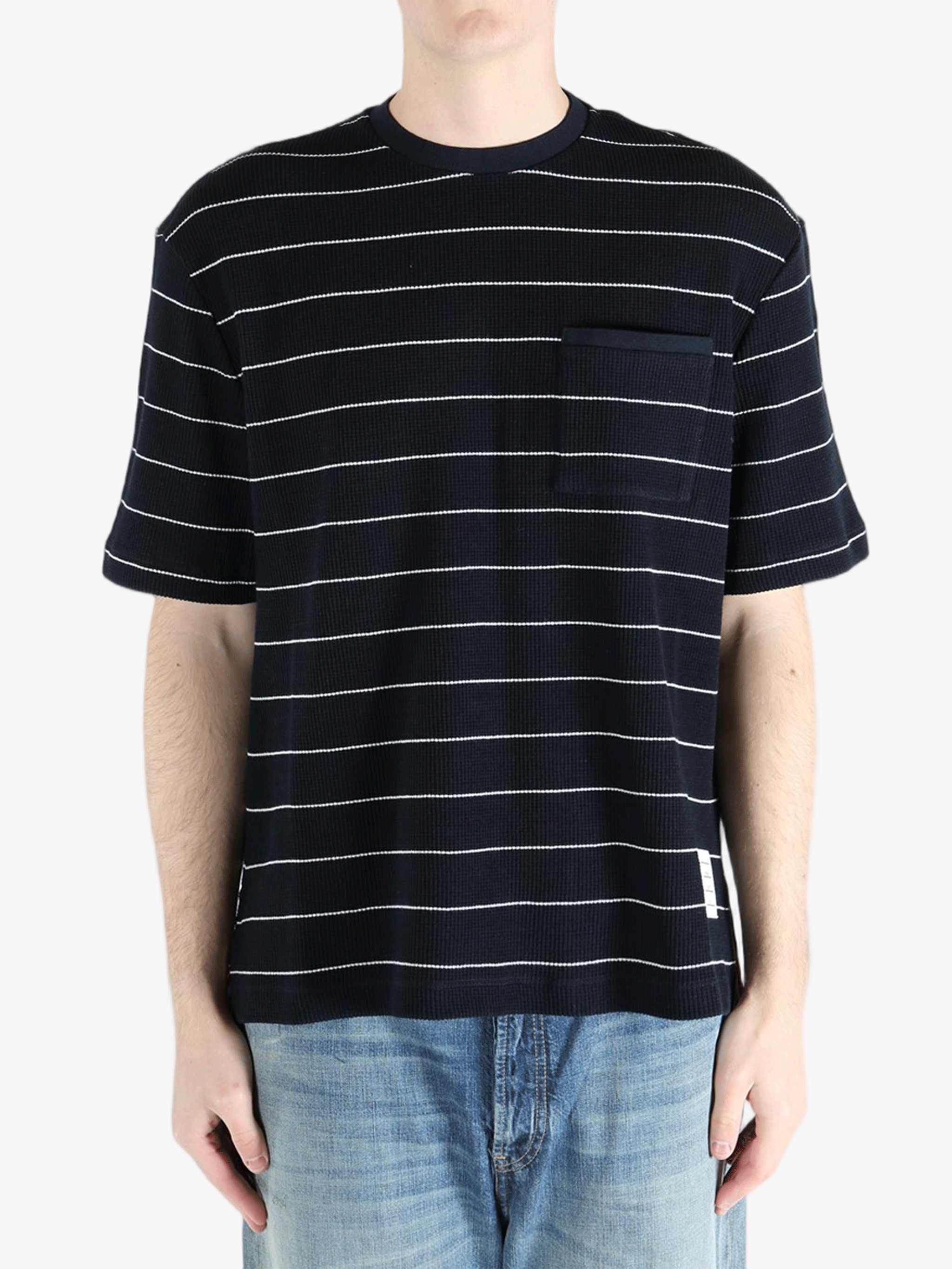 Navy t-shirt worn by a person, showing the t-shirt fit