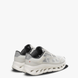 Grey sneakers, side view