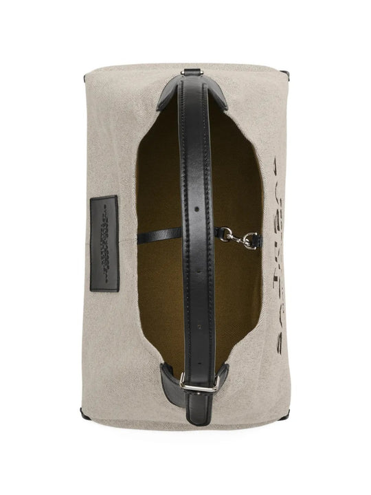 Close up of the white bag, showing texture of the leather fabric