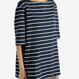 Navy top worn by a person, showing the top's fit