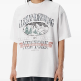 White t-shirt worn by a person, showing the shirt's fit