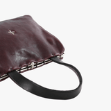 Close up of the brown bags, showing texture of the fabric