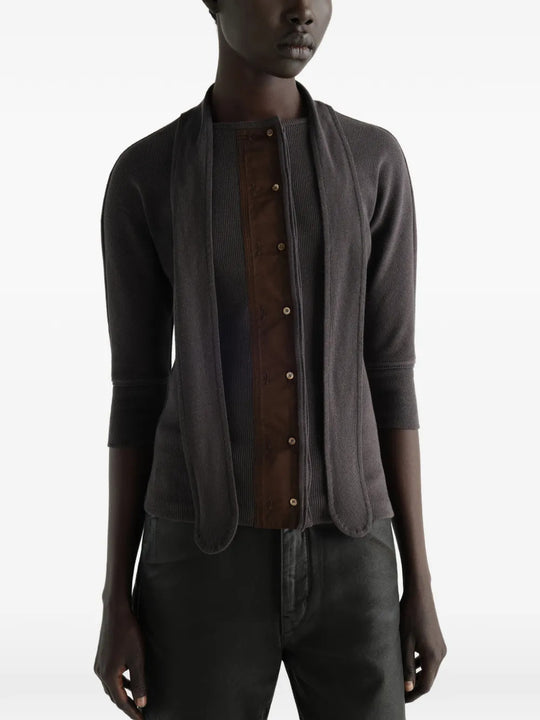 Grey t-shirt worn by a person, showing the t-shirt fit