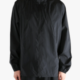 Black jacket worn by a person, showing the jacket's fit