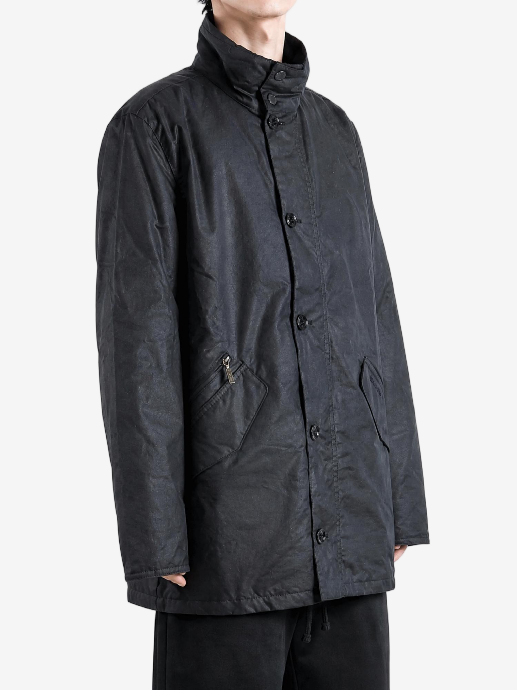 Navy jacket worn by a person, showing the jacket fit