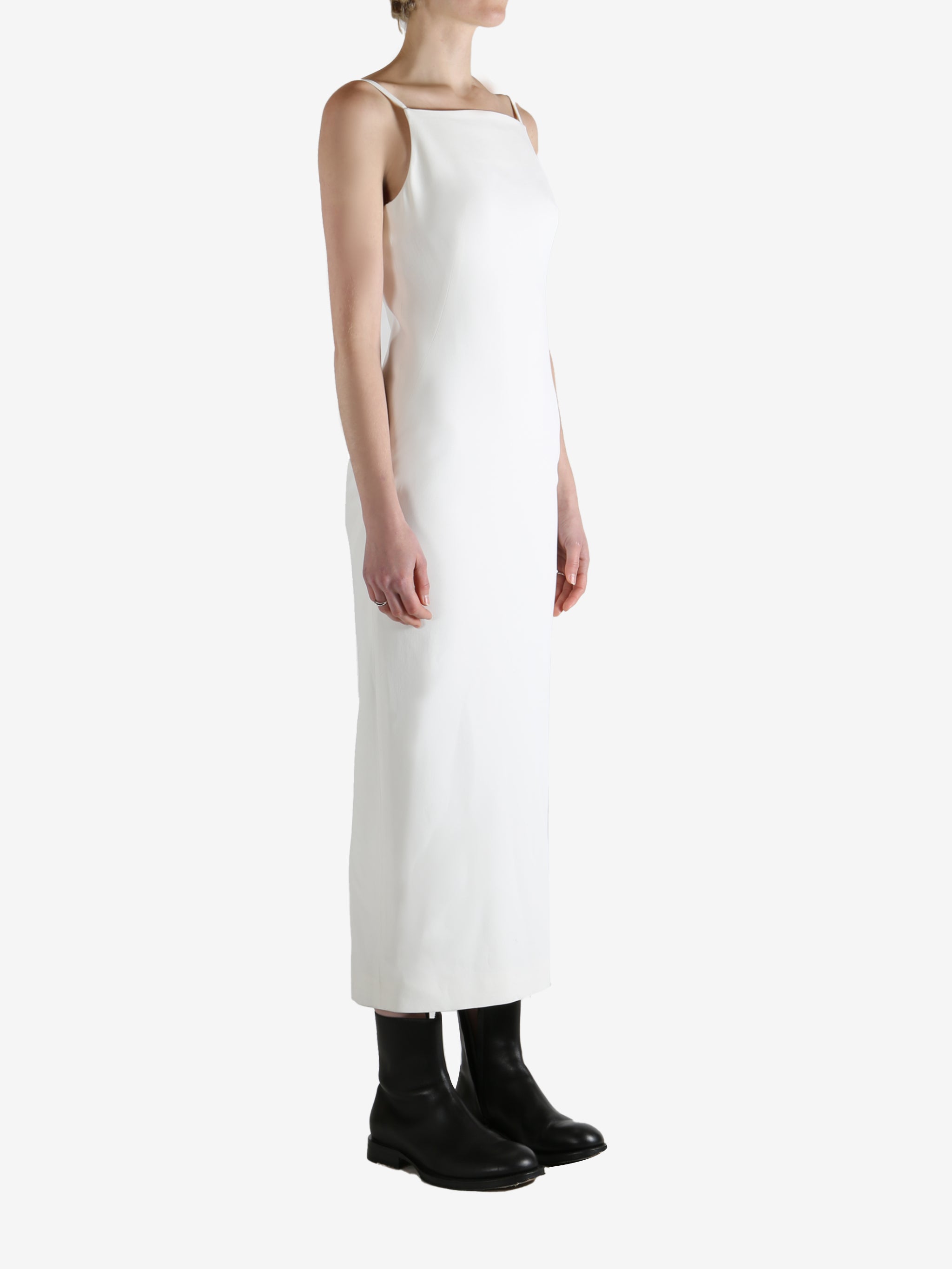 White dresses worn by a person, showing the dresses fit