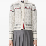 white knitwear worn by a person, showing the knitwear fit