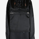 Black jacket worn by a person, showing the jacket's fit