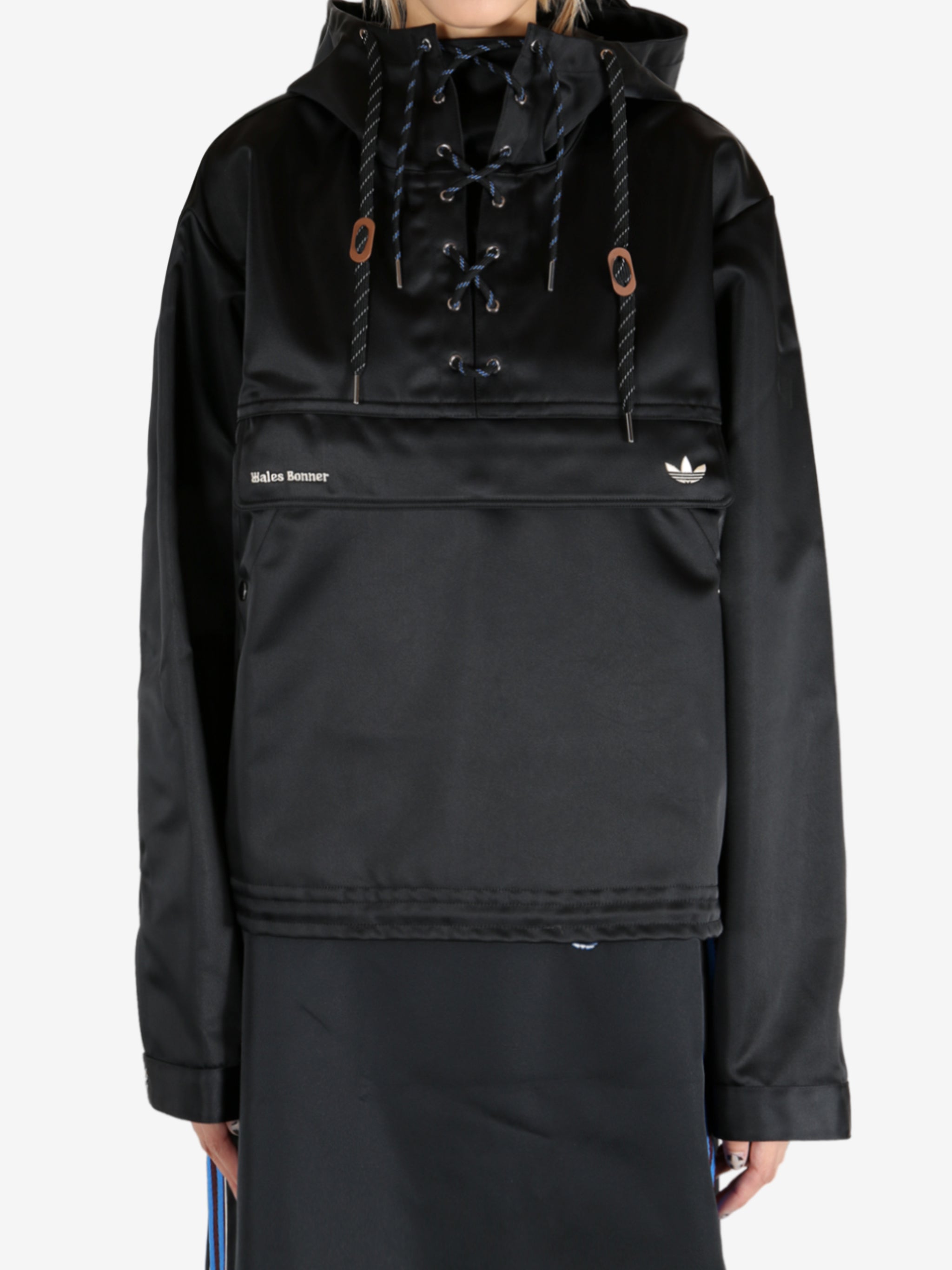 Black jacket worn by a person, showing the jacket's fit