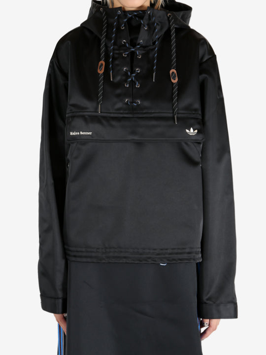 Black jacket worn by a person, showing the jacket's fit