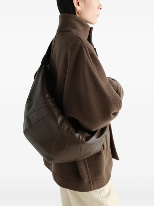 Brown bag worn by a person, showing the bag fit