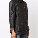 Brown jacket worn by a person, showing the jacket's fit