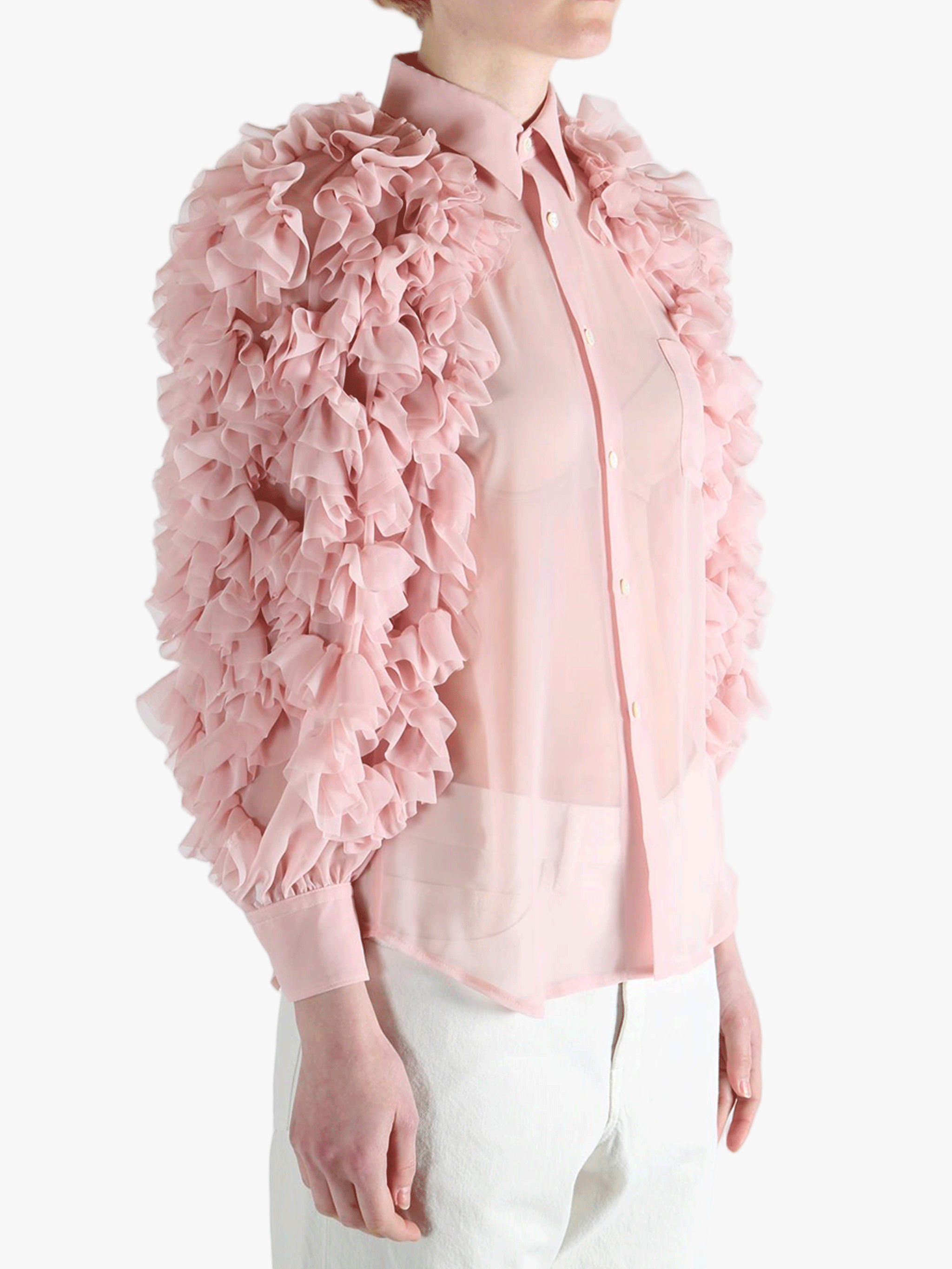 Pink blouse worn by a person, showing the blouse fit