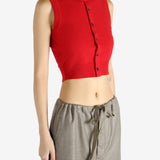 Red top worn by a person, showing the top's fit