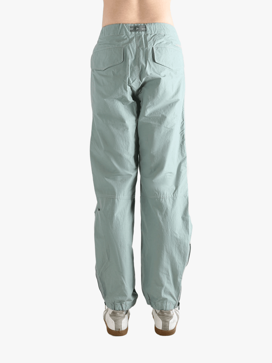Blue pants worn by a person, showing the pants's fit