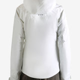 White jacket worn by a person, showing the jacket fit