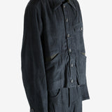 Black jacket worn a person, showing the jacket's fit