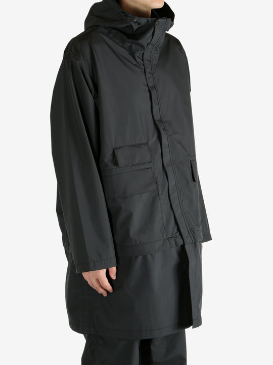 Black jackets worn by a person, showing the jacket’s fit