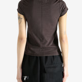 Brown shirt worn by a person, showing the shirt fit