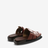 Tan mules, back view