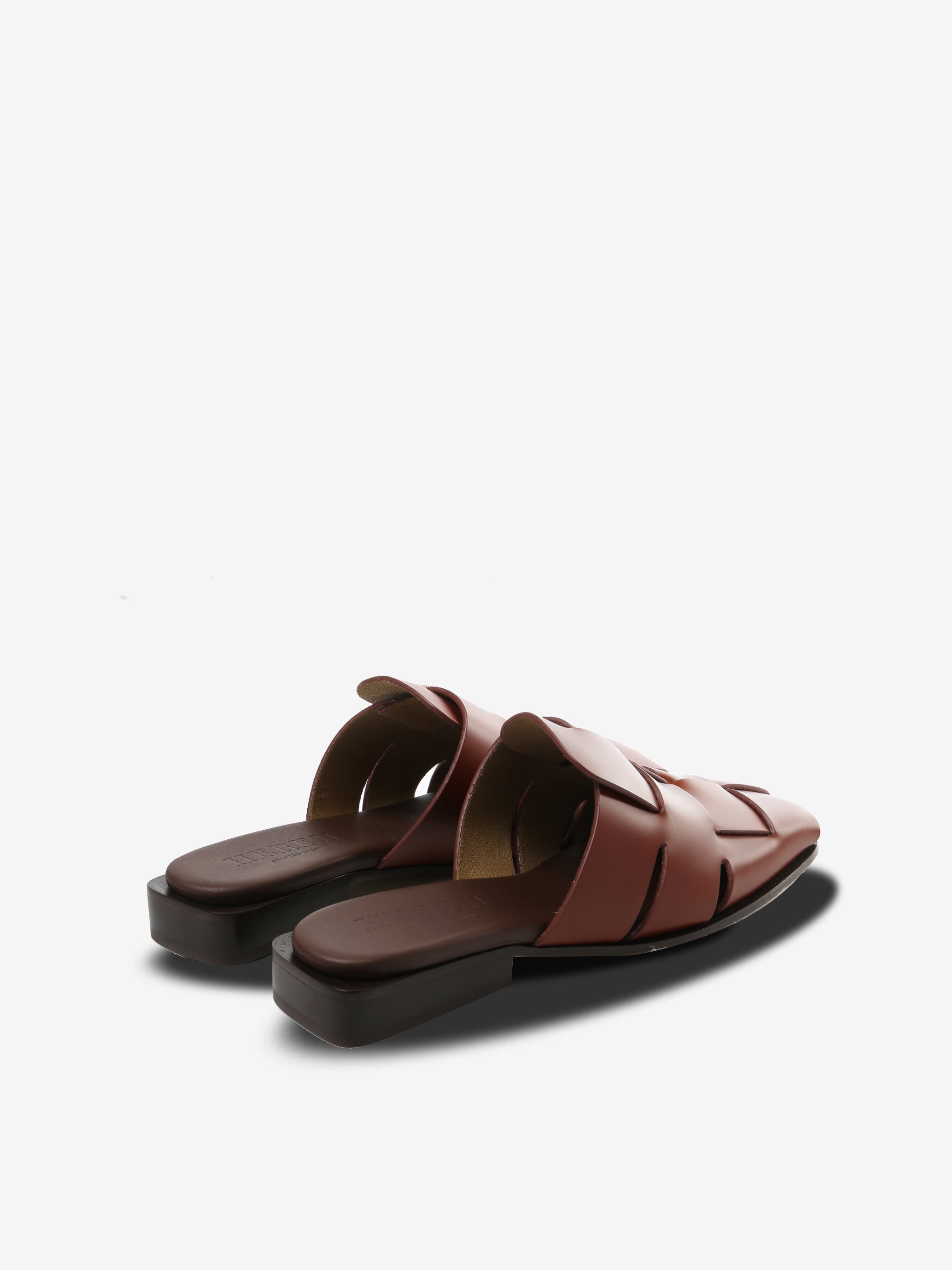 Tan mules, back view