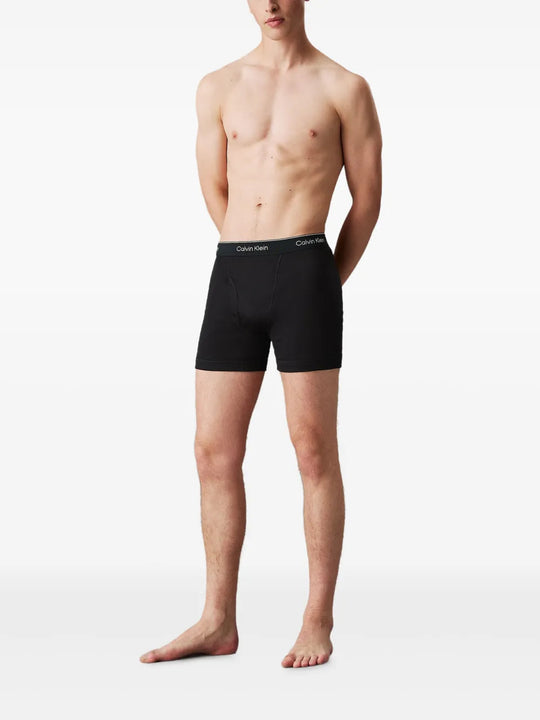 Black shorts, full body view