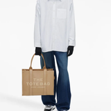 Tan bags, full body view