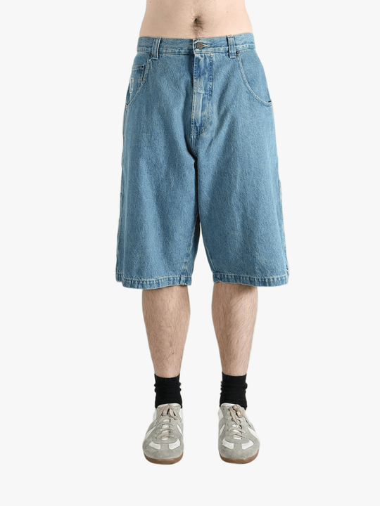 Blue short worn by a person, showing the fit