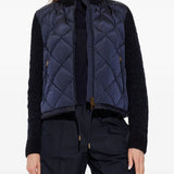 Navy jacket worn by a person, showing the jacket fit