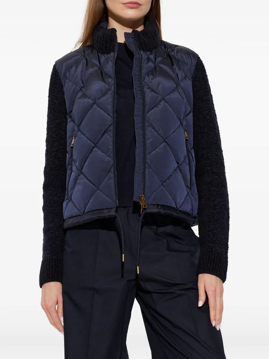 Navy jacket worn by a person, showing the jacket fit