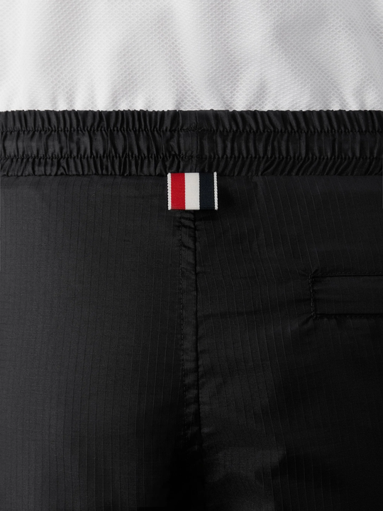 Close up of black pants, showing texture of the Nylon fabric