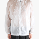 White jacket worn by a person, showing the jacket fit