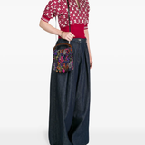 Orange bag worn by a person, showing the bag fit