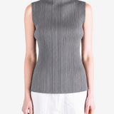 Grey shirt worn by a person, showing the shirt fit