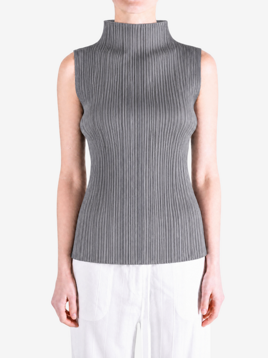Grey shirt worn by a person, showing the shirt fit