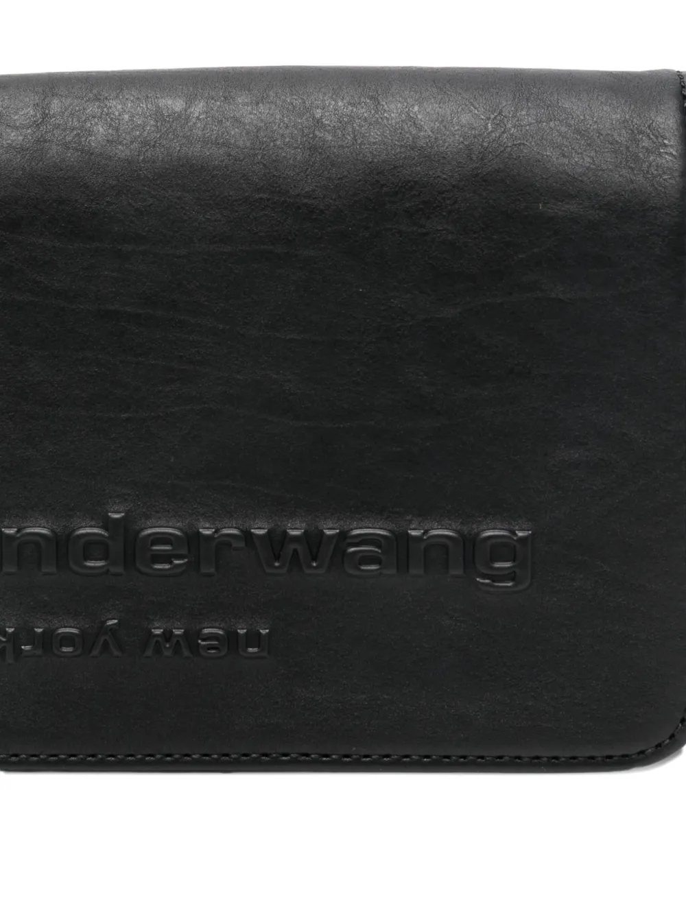 Close up of black bag, showing texture of the calf leather fabric