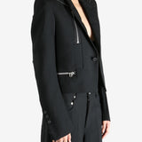 Black jacket worn by a person, showing the  jacket fit