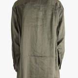 Grey top worn by a person, showing the top's fit